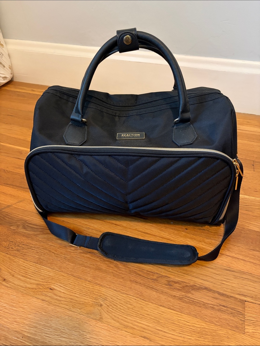 Kenneth Cole Reaction black Quilted Front Duffel with Gold Accents